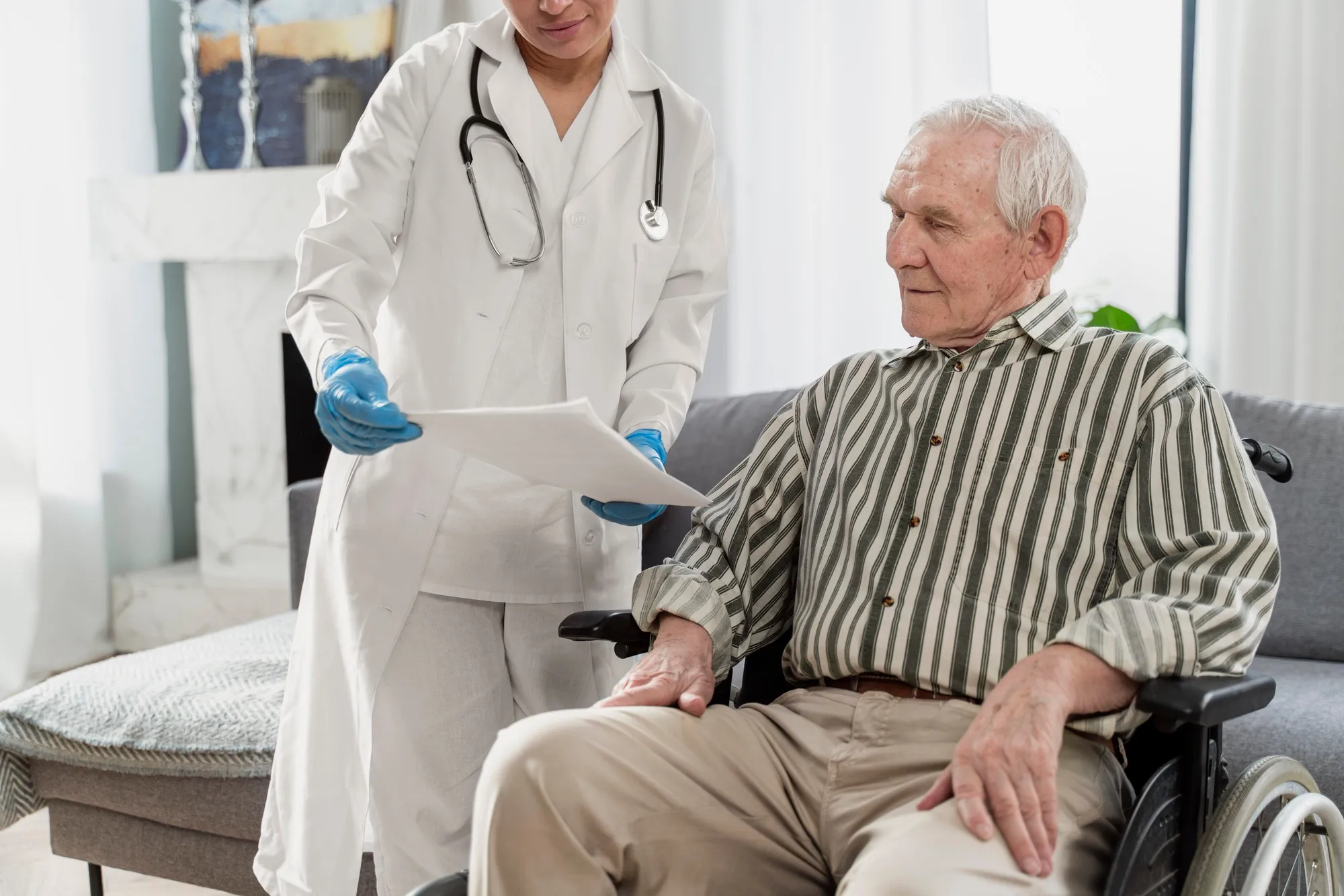 doctor-talking-senior-man-indoors_23-2148962351